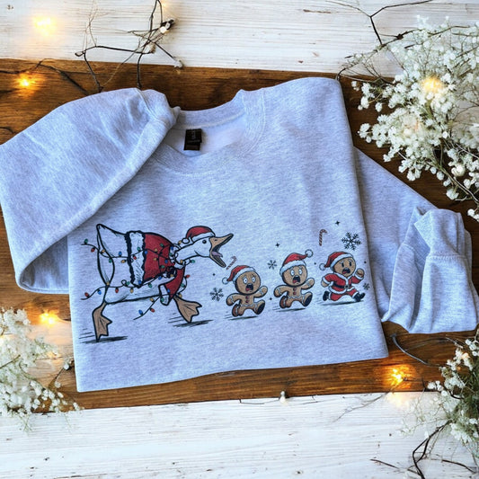 Christmas Duck & Gingerbread Chase Sweatshirt