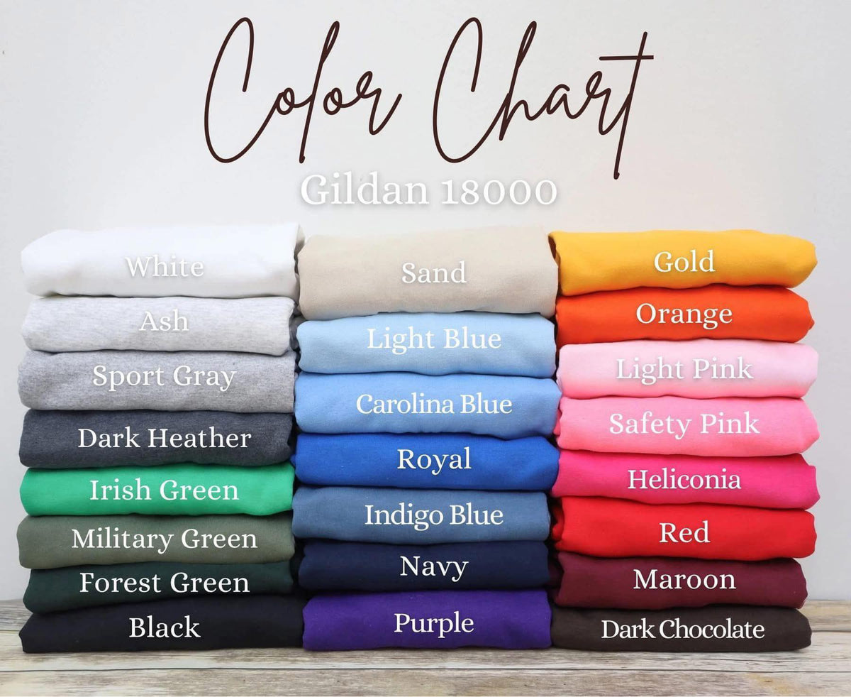 Color chart for Gildan 18000 with folded t-shirts in various colors.