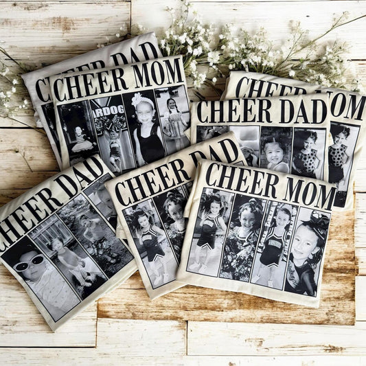 Set of 'Cheer Dad' and 'Cheer Mom' coasters with black and white photos on a wooden surface.